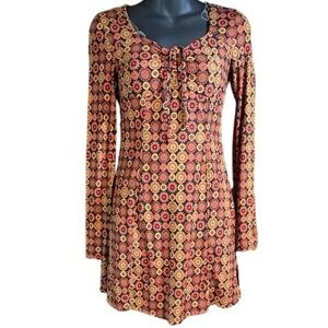 SO women's long sleeve mini dress featuring an orange and brown floral mod xs
